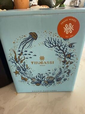 Thucassi Candle. Rare. Ocean Scented Candle - Light Blue & Gold